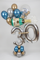 Silver 30 birthday number balloons with a blue, gold and silver base, champagne bottle balloon, personalised bubble balloon and matching helium balloons.
