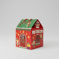 Red and green Christmas elf house box personalised with Alfie and Mia, with a red elf peeking out beneath the roof.