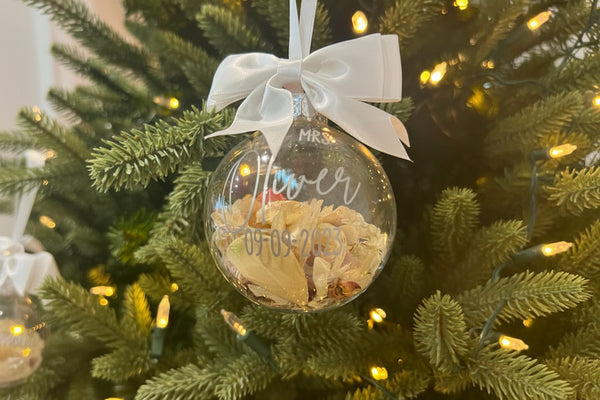 Personalised wedding confetti Christmas bauble with married surname, wedding date and white ribbon