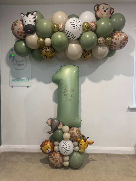 Personalised safari first birthday number display with a matching animal-print garland. Portland collection and local delivery and setup available.