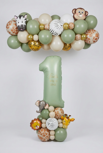 Sage green Wild One number 1 balloon with safari animals and an animal-print base, beneath a matching garland featuring zebra and monkey balloons.