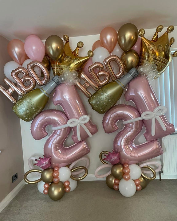 Celebrate turning 21 with pink number balloons, a gold crown, champagne bottle and helium balloons. Hi-Float included. Portland collection and local delivery.