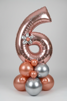 Personalised rose gold number 6 foil balloon with a silver balloon flower on a rose gold and metallic silver balloon base.
