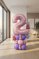 Personalised pink number 2 balloon for Lottie with Peppa Pig character balloons, a pink and purple balloon base and a metallic blue star.